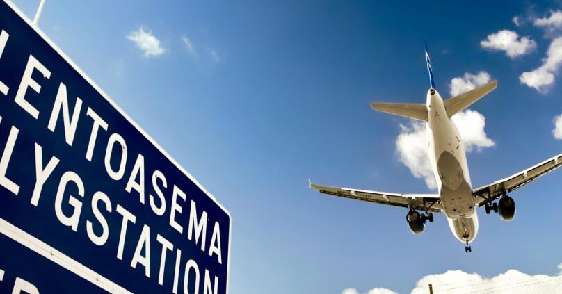 Lentoasema Flygstation airport sign and airplane