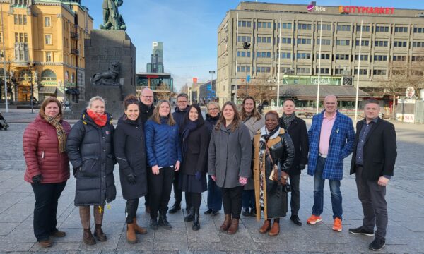 A group photo of some of the organizers gathered at Vaasa square.